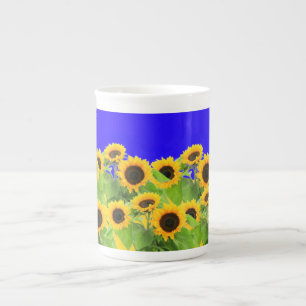 Taza De Porcelana Flores giratorias tapan los colores de la bandera