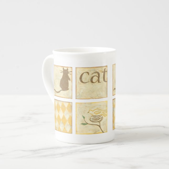 Taza De Porcelana Gato marrón y pájaro amarillo por Chariklia Zarris (Izquierda)
