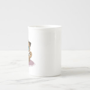 TAZA DE PORCELANA KITTEN DE OJOS AZULES MARRÓN SOBRE UNA MAT PURPLE