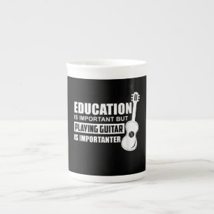 Taza De Porcelana La Educación Es Importante Pero Jugar A La Guitarr