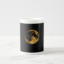 Taza De Porcelana Luna texturizada dorada sobre negro oscuro