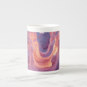 Taza de porcelana ósea con textura cálida abstract