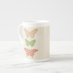 Taza De Porcelana Patrones decorativos de mariposas en fondo crema