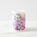 Taza De Porcelana Sakura rosa sobre fondo de pintura<br><div class="desc">Dibujado artísticamente,  rama de rosa,  flores de cerezo sobre fondo pintoresco,  texturizado,  pintado con pintura blanca,  rosa y azul. Pink Sakura</div>