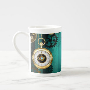 Taza De Porcelana Steampunk Jewelry Watch sobre un fondo verde