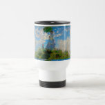 Taza De Viaje Mujer Monet Paraguas Impresionismo<br><div class="desc">La obra maestra del impresionismo de Claude Monet - Mujer con un Paraguas fue pintada por el impresionista francés Claude Monet en 1875. Muestra a una mujer con un paraguas y un niño pequeño, que es Madame Monet y su hijo. Esta pintura impresionista es una de las famosas pinturas de...</div>