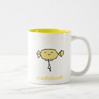 Taza del amarillo de la dicha de CandyHead