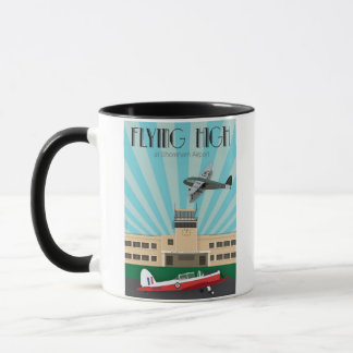 Taza del art déco con el aeropuerto y el Chipmunk