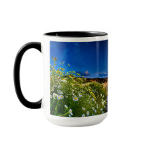 Taza del atardecer inspirador en el océano