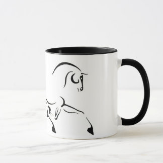 Taza del caballo que trota