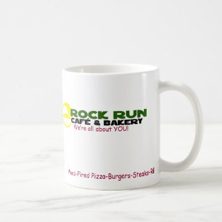 Taza del café del funcionamiento de la roca y de