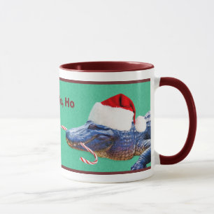 Taza del cocodrilo del navidad