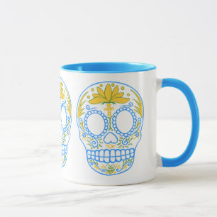 Taza del cráneo del azúcar (azul/amarillo)