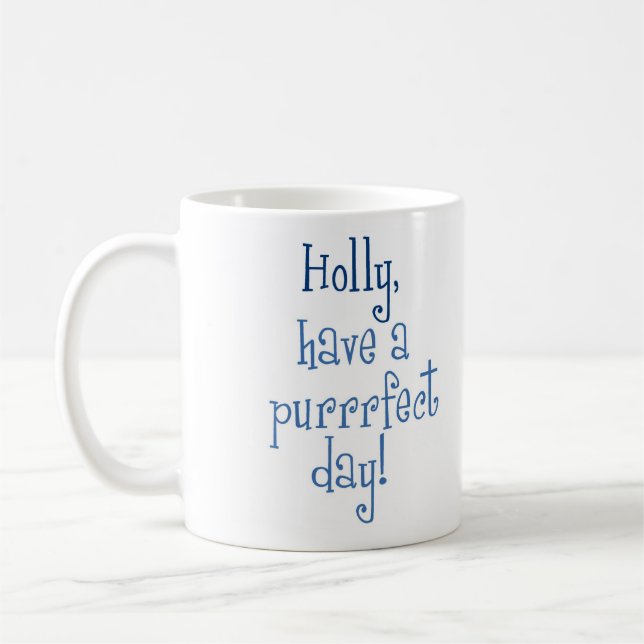 Taza del día del acebo de Purrrfect (Izquierda)