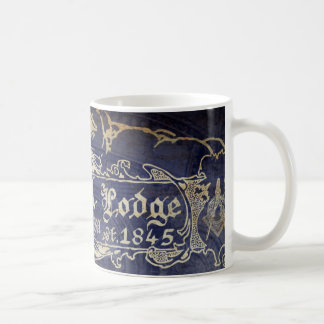 Taza del diseño de la escuela vieja