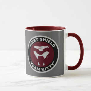 Taza del gatito del equipo