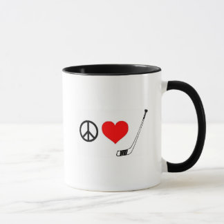 Taza del hockey del amor de la paz