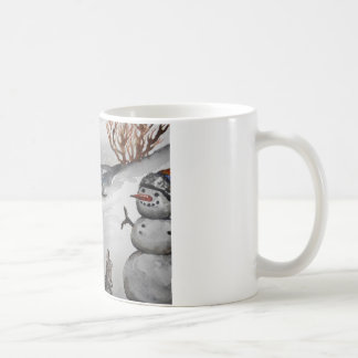 Taza del invierno del conejito y del muñeco de