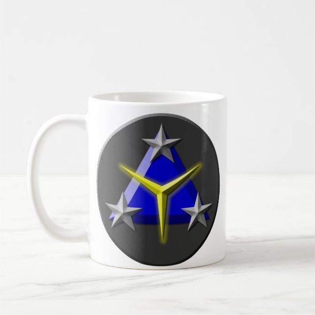 Taza del juguete Insignia/TYCS (Izquierda)