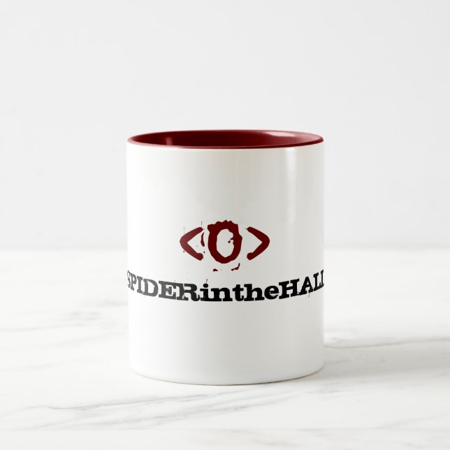 Taza del logotipo del ojo de SPIDERintheHALL (Centro)