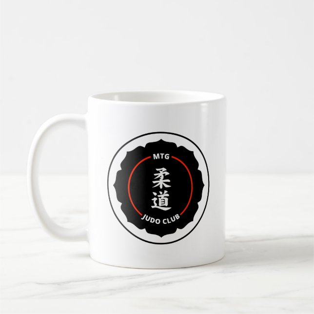 Taza del logotipo del plan del club del judo de (Izquierda)