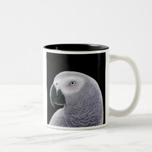 Taza del loro del gris africano