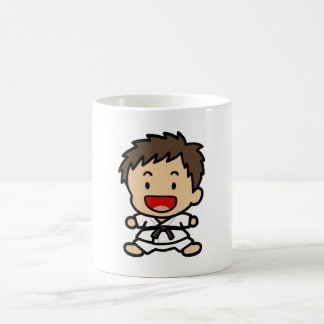 Taza del muchacho del arte marcial