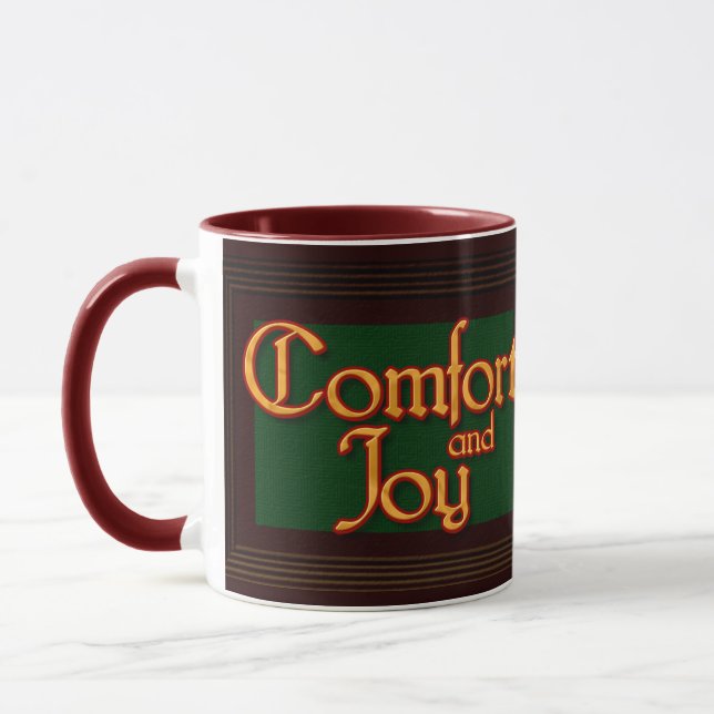 Taza del navidad de la comodidad y de la alegría (Izquierda)