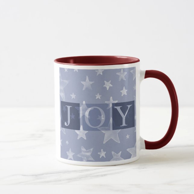 Taza del navidad de las estrellas azules de la (Derecha)