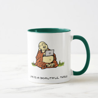 Taza del ordenador portátil de Buda