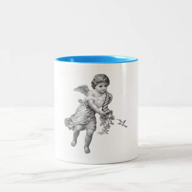 Taza del pájaro del ángel y del tarareo (Centro)