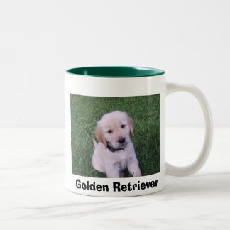 Taza del perrito del golden retriever