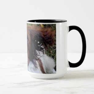 Taza del perro de la acción