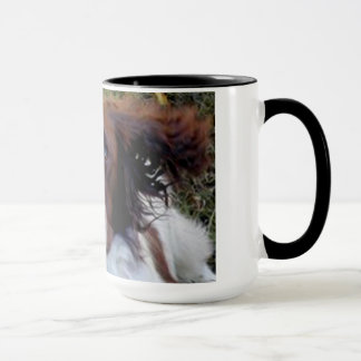 Taza del perro de la acción