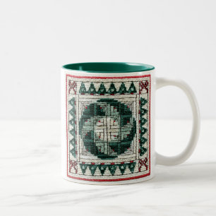 Taza del punto de cruz del navidad