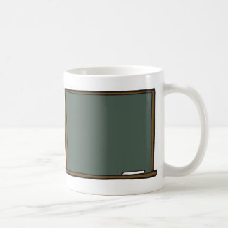 Taza del tablero de la tiza del profesor en blanco