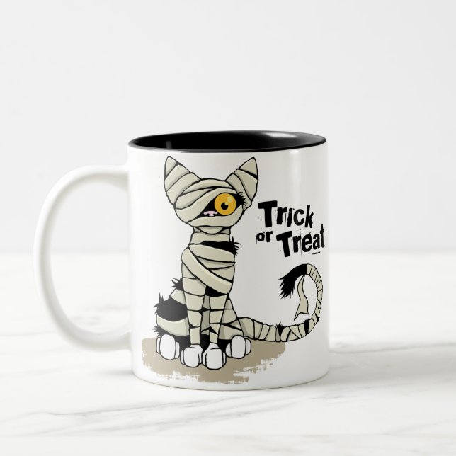 Taza del truco o de la invitación del gato de la (Izquierda)