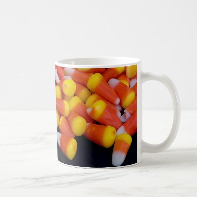 Taza derramada de las pastillas de caramelo (Derecha)