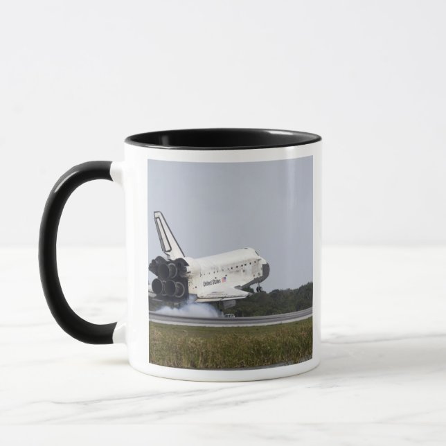 Taza Descubrimiento del lanzador espacial toca hacia ab (Izquierda)