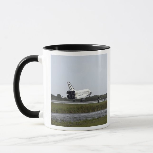Taza Descubrimiento del lanzador espacial toca hacia ab (Izquierda)