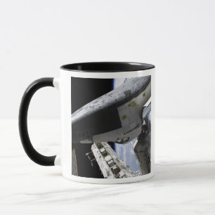 Taza Descubrimiento del transbordador espacial atracado