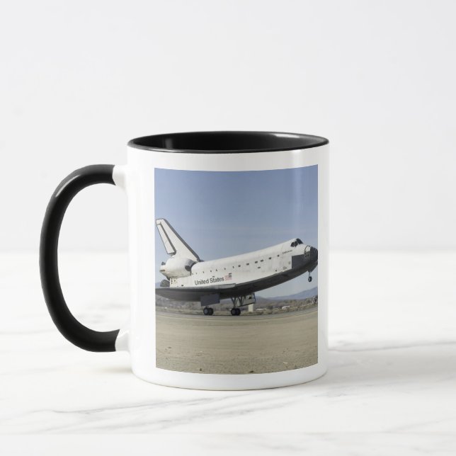 Taza Desembarco principal del transbordador espacial En (Izquierda)