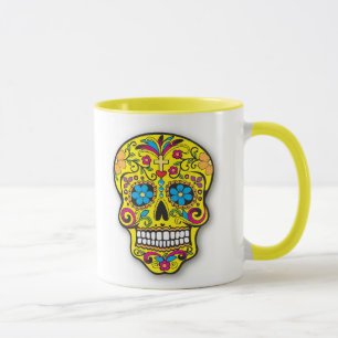 Taza Día mexicano amarillo brillante del cráneo del