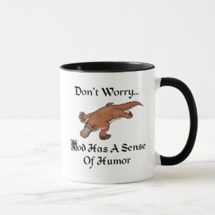 Taza Dios Tiene Sentido del Humor - Ornitorrinco Divert