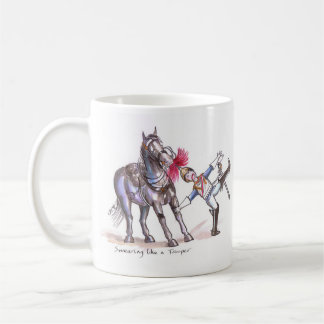 Taza divertida del dibujo animado de los azules y