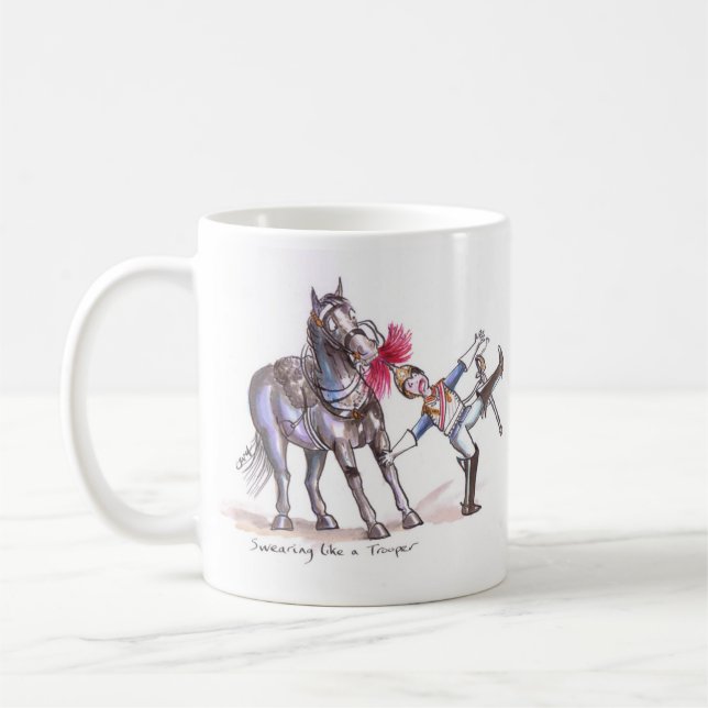 Taza divertida del dibujo animado de los azules y (Izquierda)