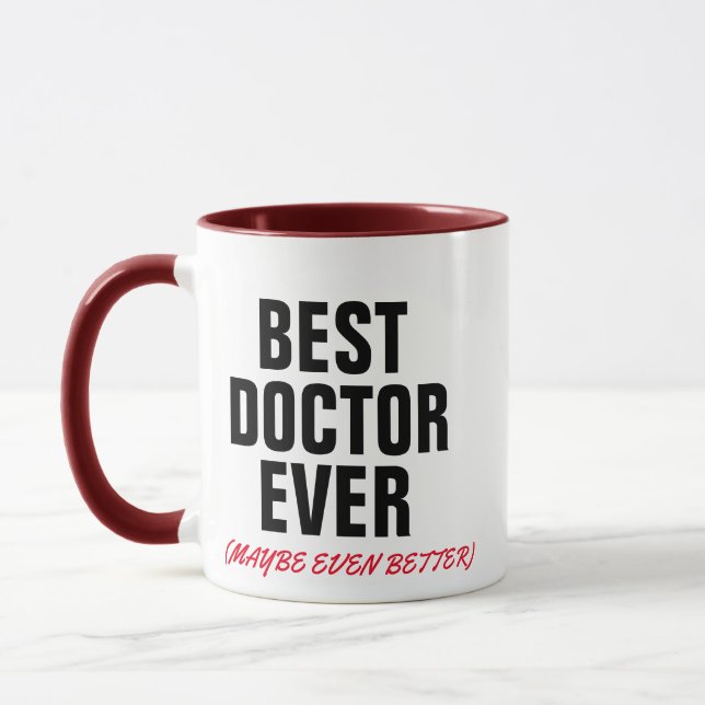 Taza divertido médico de la mejor salud del médico (Izquierda)