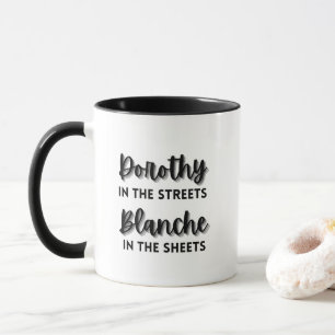 Taza Dorothy en las calles Blanche en las hojas