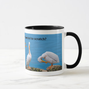 Taza Dos pelícanos con un picor