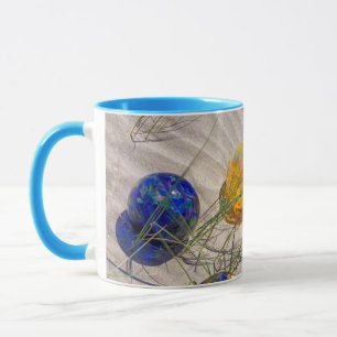 Taza EE. UU., Oregón. Coloridos flotadores de vidrio en